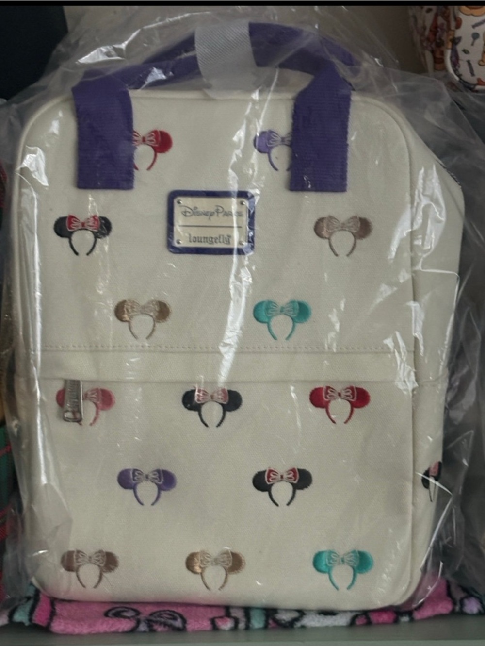 Disney Parks Loungefly Cream Minnie Ear Backpack with Multicolor Bows